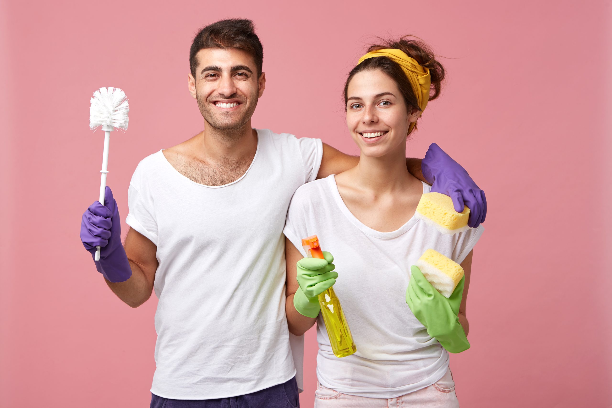 happy cleaning couple