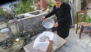 old woman using old cleaning method