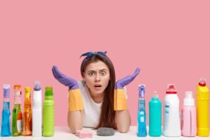 woman selecting a cleaning product